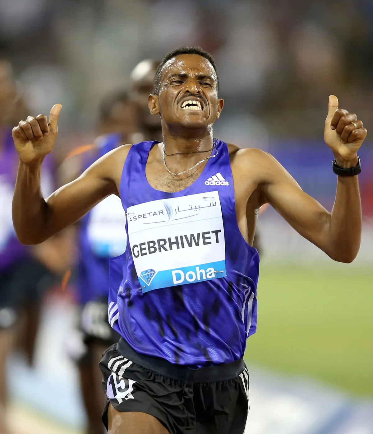 Hagos Gebrhiwet celebrating at the Doha Diamond League meeting, May 2015